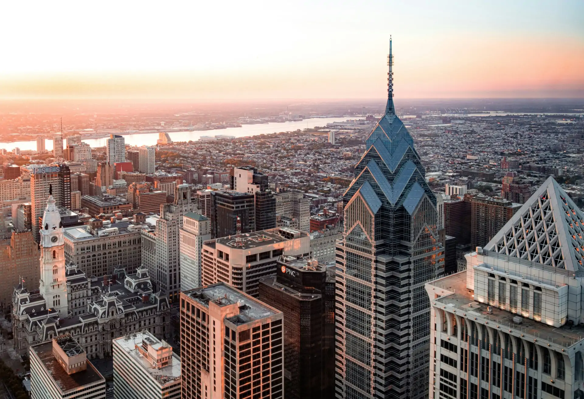 An aerial view of Philadelphia’s skyline, featuring skyscrapers and modern buildings.