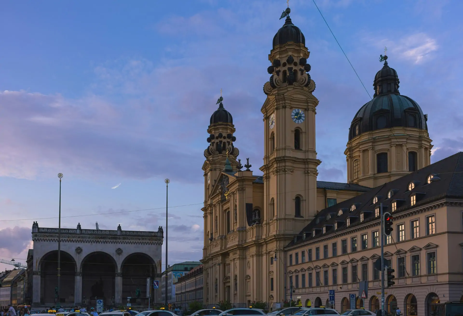 A view of some of Munich’s historical buildings at dusk.